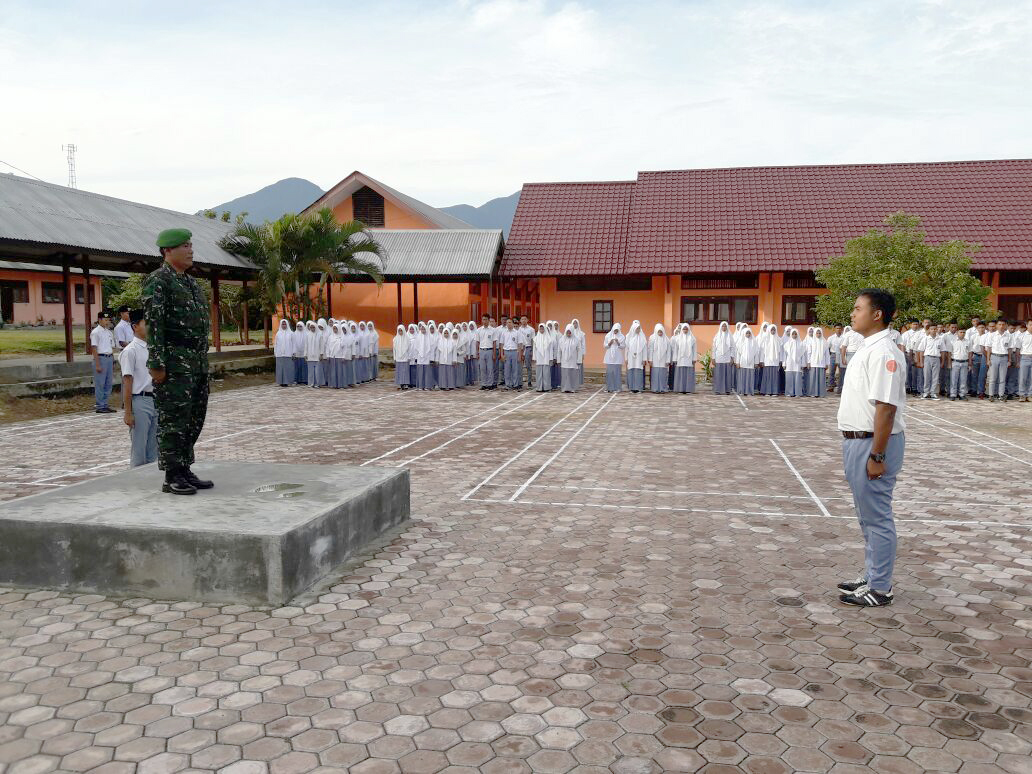 Koramil Jantho, Laksanakan Upacara Bendera Bersama di SMKN 1 Jantho