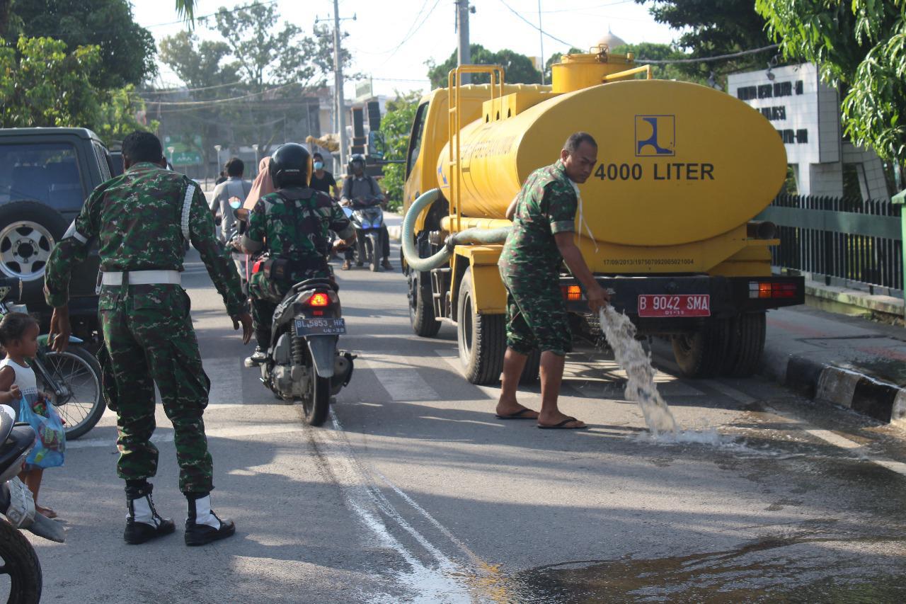 TNI, Melakukan Upaya Pembersihan Pasca Letusan Sinabung