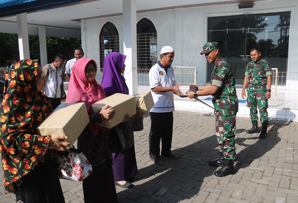 Prajurit Yonif Raider 112/DJ Karya Bakti Bersama Masyarakat