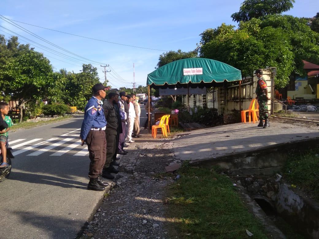 Koramil 10/Labar Bersama Dinas Terkait, Perketat Pemeriksaan Suhu Tubuh di Posko Perbatasan Pemantauan Covid-19