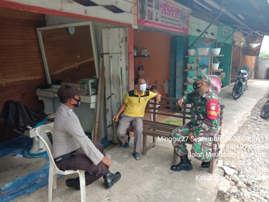 Pantau Penerapan Protkes, Babinsa dan Bhabinkamtibmas Keliling Desa Binaan