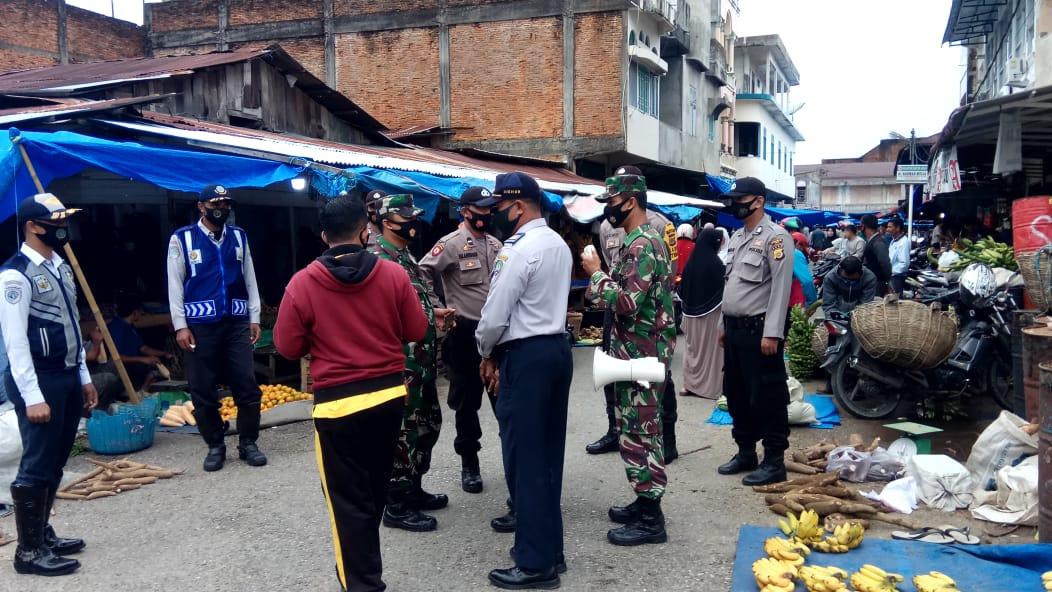 Anggota Koramil 01/Blangpidie Bersama Muspika,Melaksanakan Himbauan Protokol Kesehatan