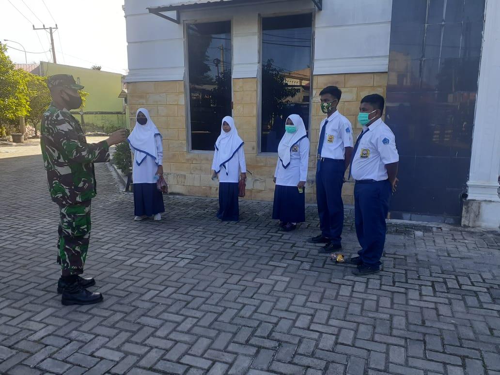 BABINSA KORAMIL 10/PEUKAN BADA PELOPOR PROTOKOL KESEHATAN
