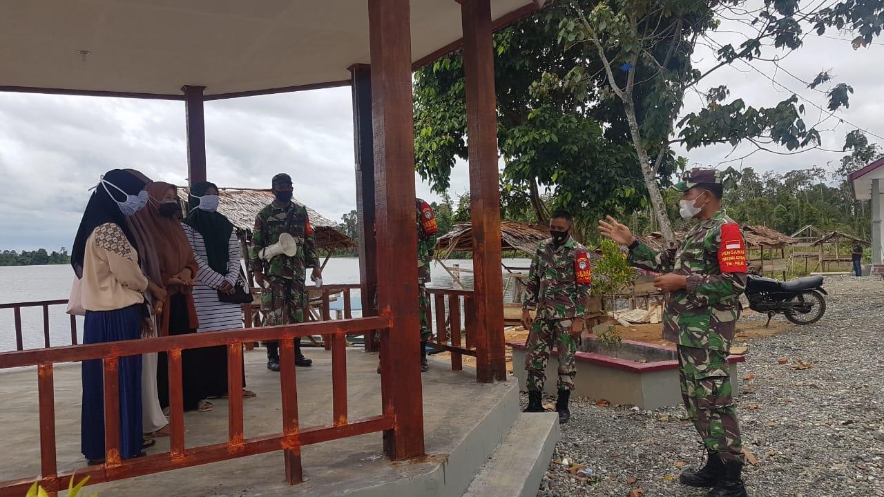 Danposramil Tadu Raya dan Anggota Laksanakan Prokes di Tempat Pariwisata