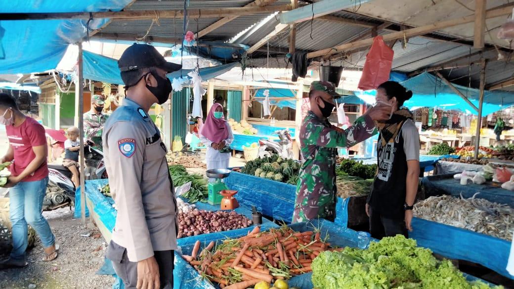 Satgas Covid-19 kodim 0116/Nagan Raya Laksanakan Himbauan Prokes di Pasar Tradisional