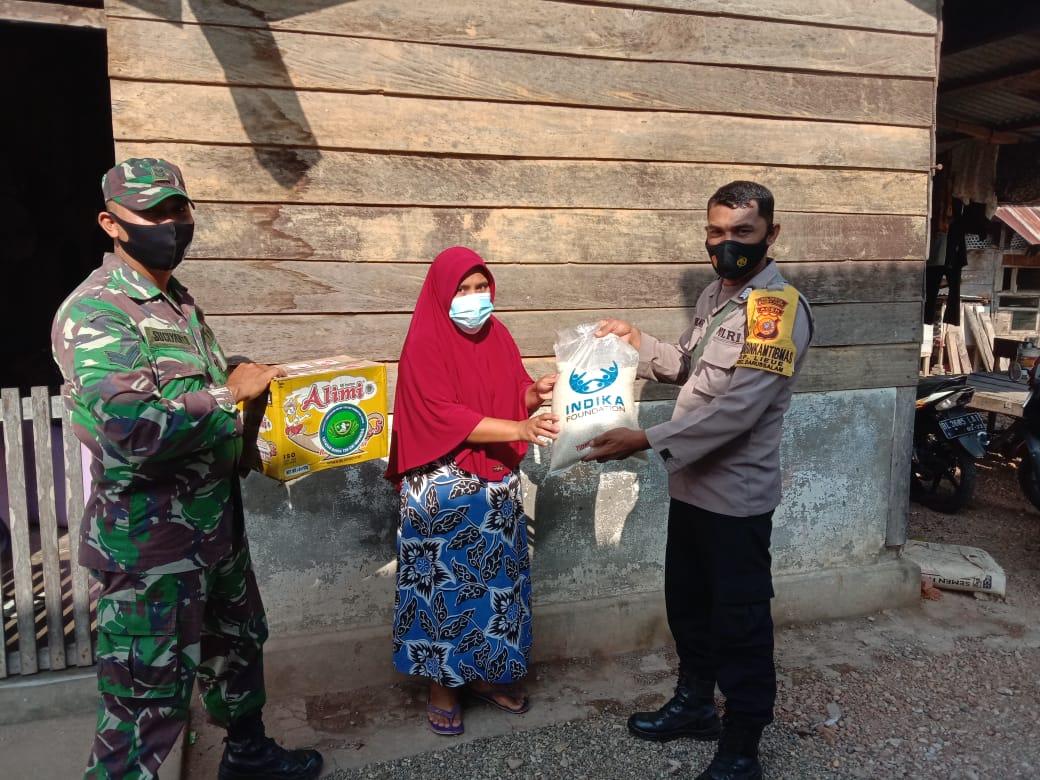 Wujud Kepedulian, Babinsa dan Babinkamtibmas Melaksanakan Bakti Sosial