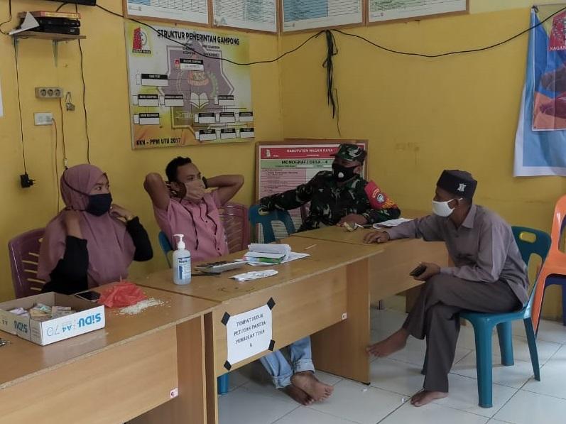 Kebersamaan Babinsa dan aparatur desa serta warga desa binaan