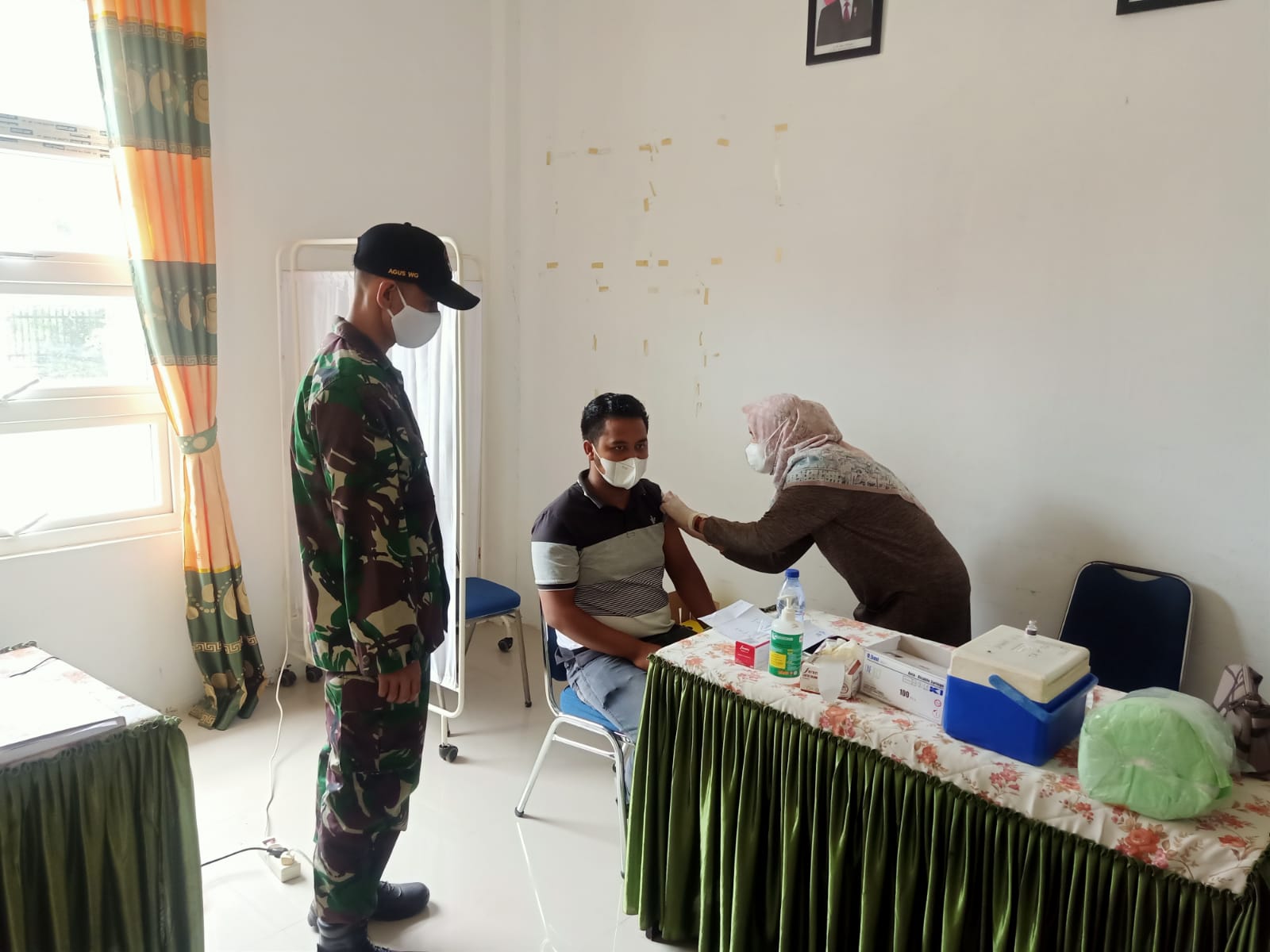 Pastikan Berjalan Lancar TNI Kodim 0103/Aceh Utara Terus Kawal Kegiatan Serbuan Vaksinasi