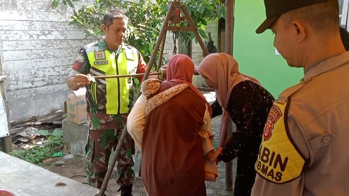 Peran Aktif Babinsa Koramil 02/Karang Baru Dampingi Posyandu Di Desa Binaan