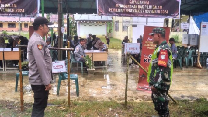 Babinsa Dan Bhabinkamtibmas Amankan Tempat Pemungutan Suara Pilkada 2024