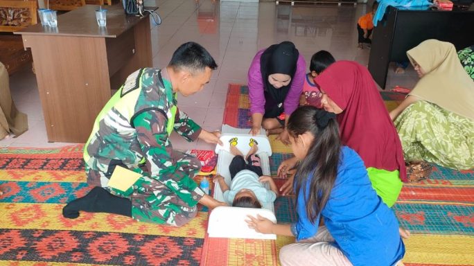 Wujudkan Balita Sehat, Babinsa Dampingi Pelaksanaan Posyandu Di Desa Binaan