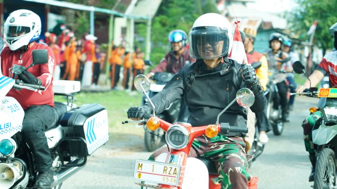 Ratusan Peserta Antusias Mengikuti Pawai Dan Apel Kebangsaan Nuansa Merah Putih Diwilayah Kodim 0105/Abar