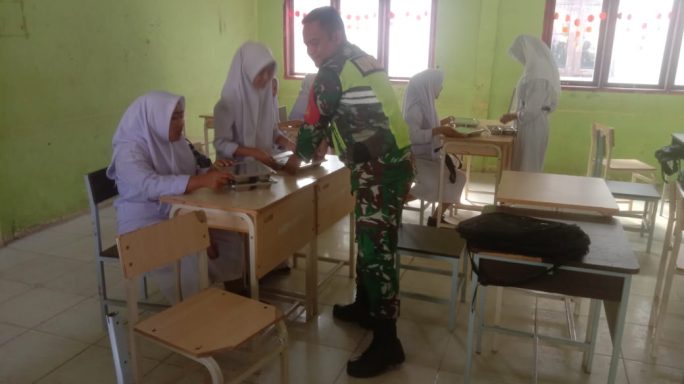 Babinsa Posramil Ketambe Terus Gencar Dampingi Makan Bergizi Gratis di Wilayah Teritorial Posramil