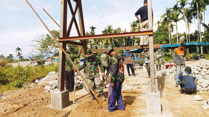 Kodim 0108/Agara Plaster Pondasi Jembatan Gantung, di Desa Teger Miko, Aceh Tenggara.